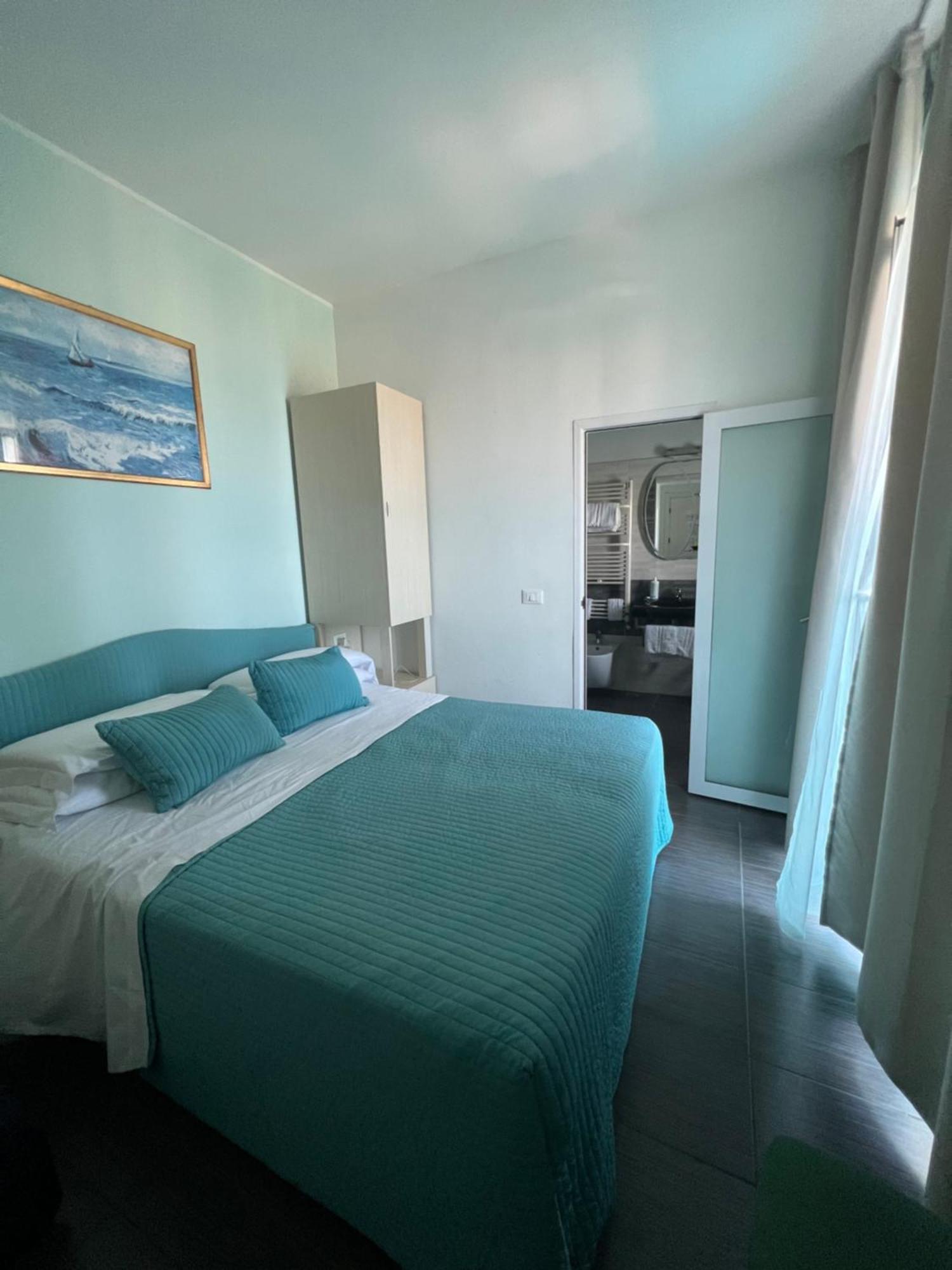 Hotel Spiaggia Marconi Rimini Bagian luar foto